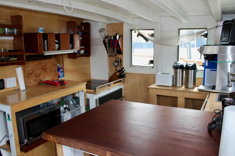 Slide: The Image of Interior of 1988 Custom Lahaina Welding Co. Square Topsail Ketch with kitchen amenities. - 41