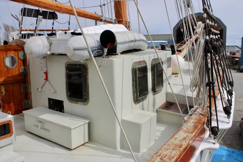 Slide: The Image of 1988 Custom Lahaina Welding Co. Square Topsail Ketch deck with lifeboat and rigging. - 4