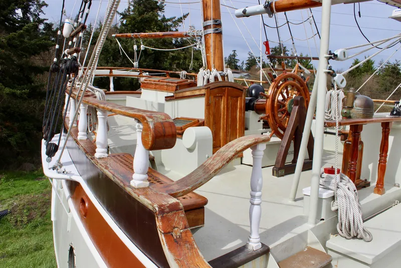 Slide: The Image of 1988 Custom Lahaina Welding Co. Square Topsail Ketch with wooden deck and rigging details. - 7