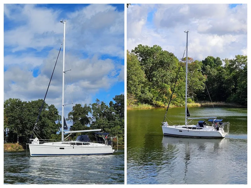 Slide: The Image of Sailboat Hunter e36, 2011 model, on a serene lake with lush greenery. - 10
