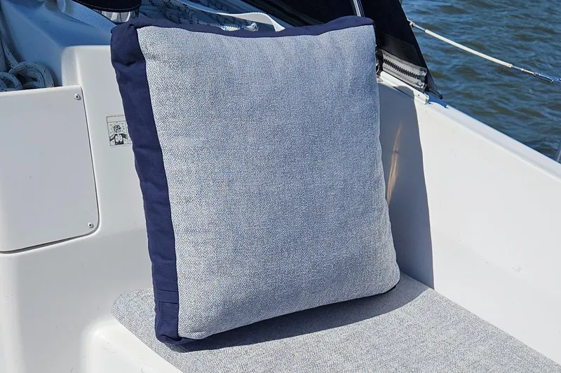 Slide: The Image of Cushion on a 2011 Hunter e36 boat seat, with blue and gray fabric. - 37