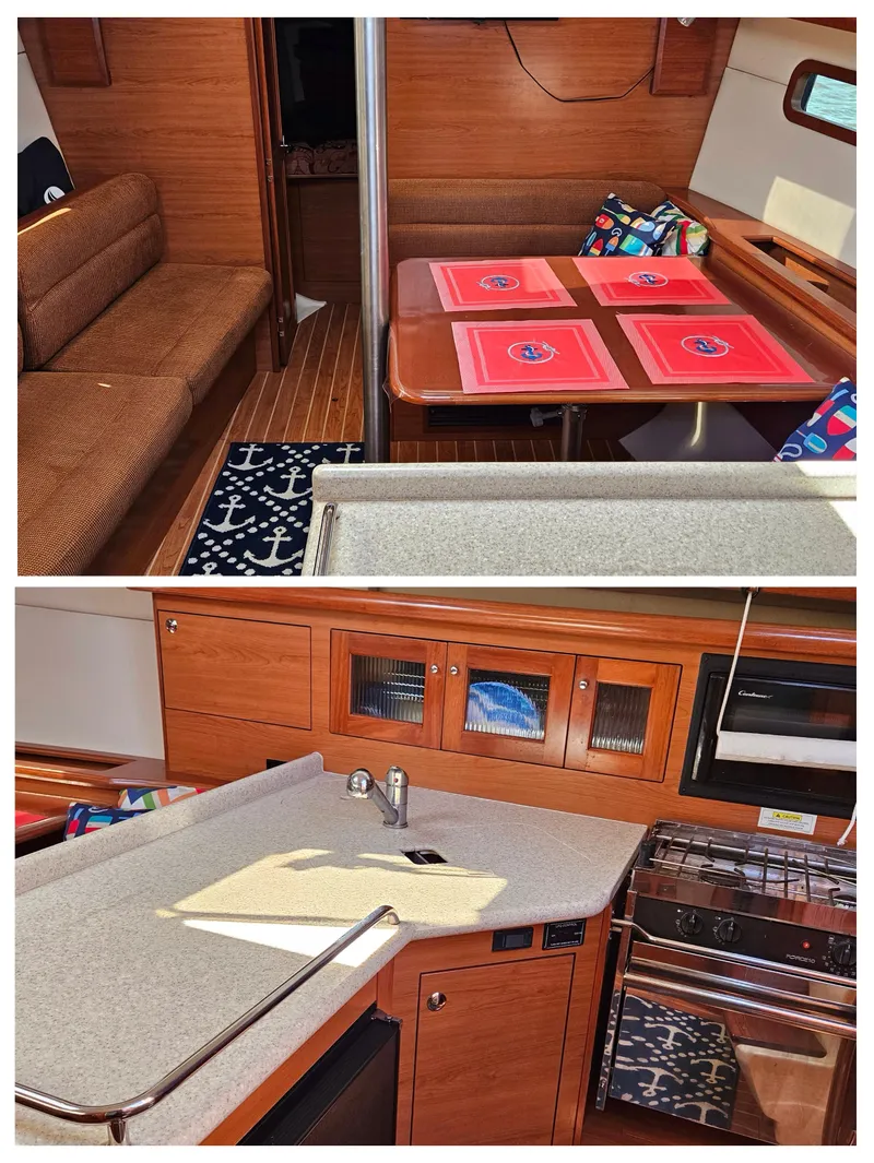 Slide: The Image of Interior of 2011 Hunter e36 sailboat with dining and kitchen areas. - 49