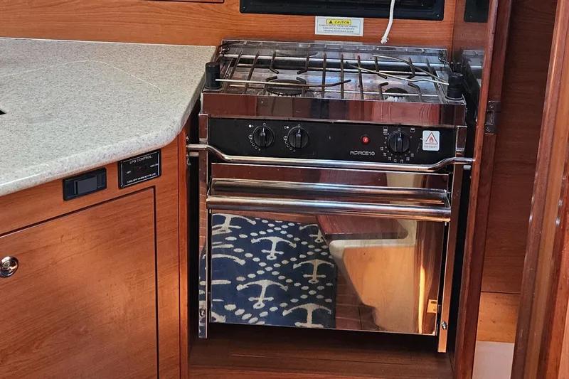 Slide: The Image of Stainless steel stove in a Hunter e36 yacht kitchen, 2011 model. - 50