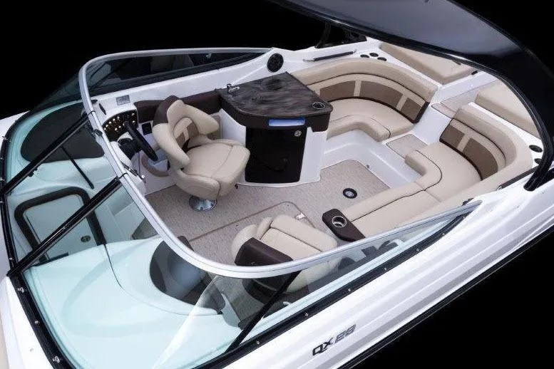 Slide: The Image of 2017 Rinker QX29 BR boat interior with luxurious seating and modern design. - 26