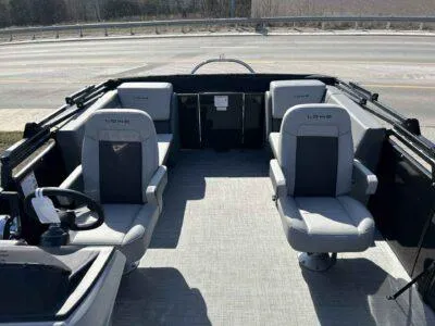 Slide: The Image of Interior of 2025 Lowe LS 230 boat with four gray seats. - 8