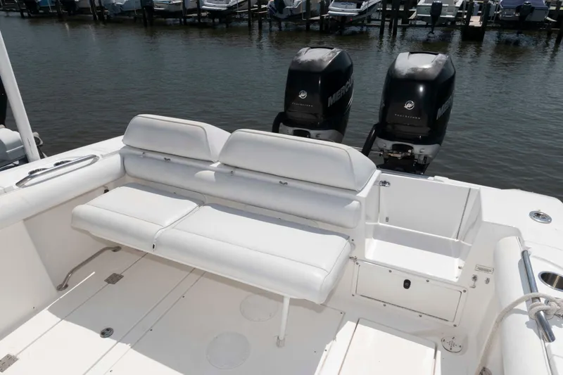 Slide: The Image of 2008 Marlago FS 35 Center Console Cuddy with dual Mercury engines and white seating. - 10