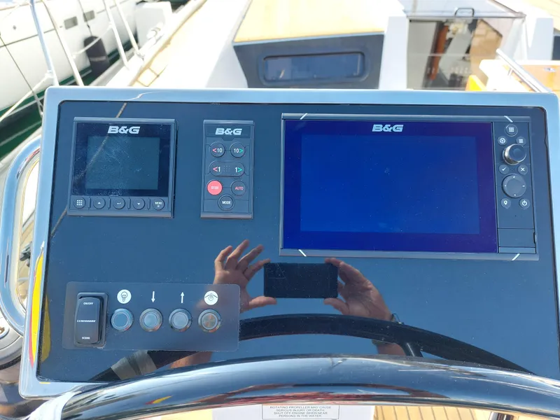 Slide: The Image of Control panel of a 2022 Beneteau Oceanis 46.1 yacht with B&G navigation displays. - 15