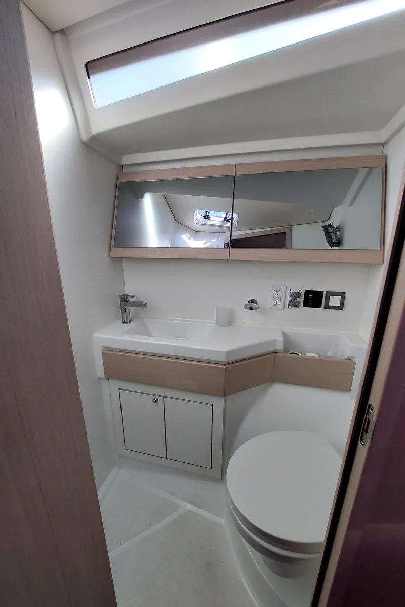 Slide: The Image of Modern bathroom interior of 2022 Beneteau Oceanis 46.1 yacht with sleek fixtures. - 43