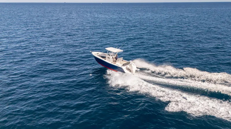 Slide: The Image of 2025 SeaWell 240CC boat cruising on open ocean waters. - 10