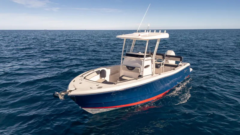 Slide: The Image of 2025 SeaWell 240CC boat cruising on open ocean waters. - 3