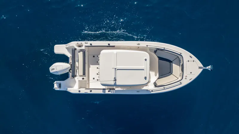 Slide: The Image of Top view of 2025 SeaWell 240CC boat on blue ocean water. - 6