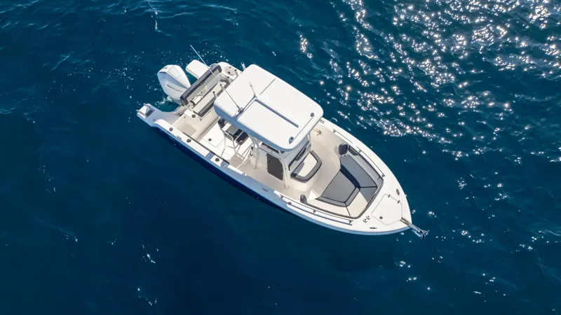 Slide: The Image of Aerial view of 2025 SeaWell 240CC boat on clear blue water. - 7