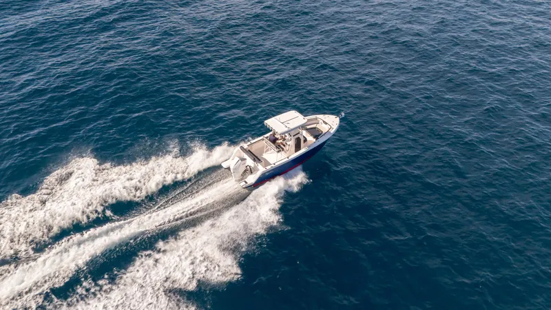 Slide: The Image of Aerial view of 2025 SeaWell 240CC boat cruising on open ocean waters. - 8