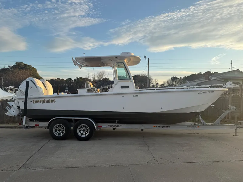 Slide: The Image of 2023 Everglades 273 Center Console boat on trailer, side view. - 0