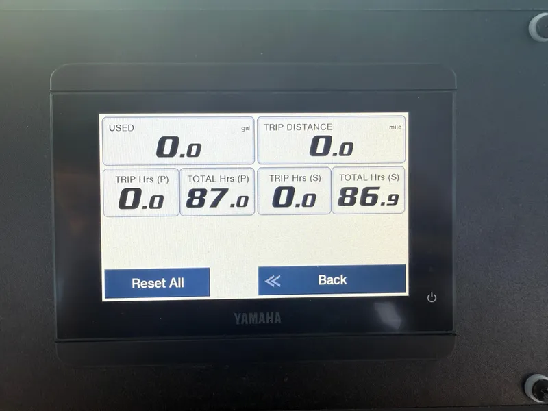 Slide: The Image of Yamaha display on 2023 Everglades 273 Center Console showing trip and engine hours. - 17