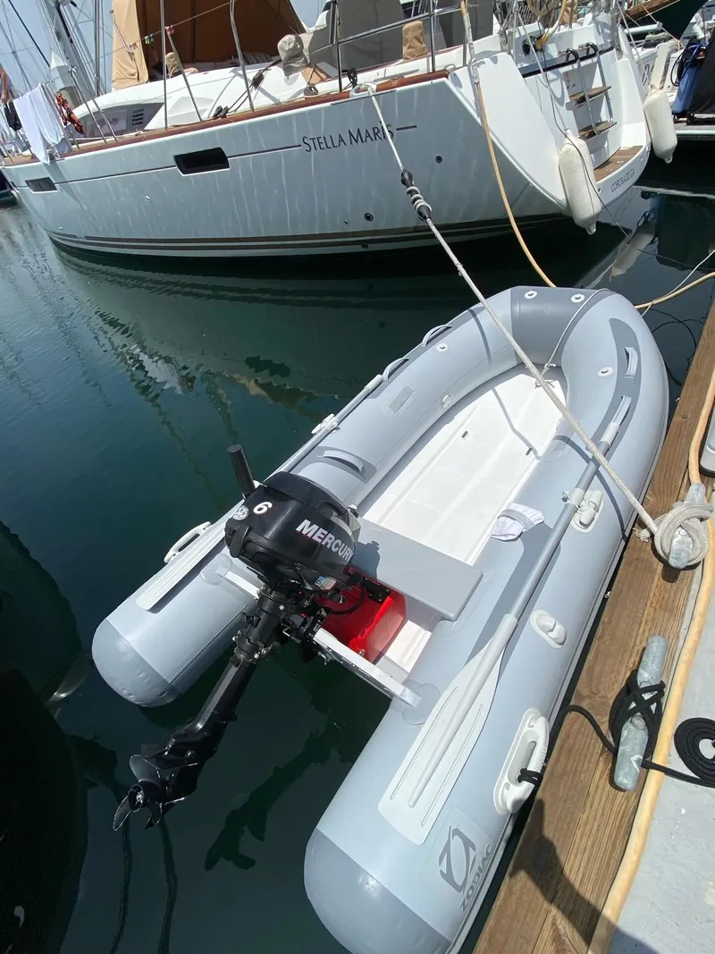Slide: The Image of Inflatable boat with motor docked beside 2014 Jeanneau 57 yacht. - 17
