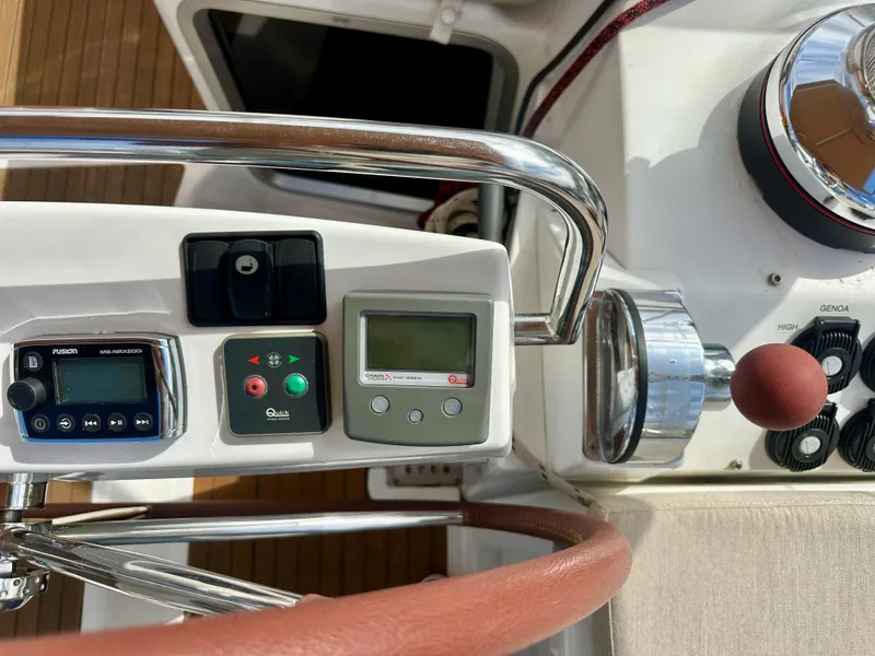 Slide: The Image of Control panel of a 2014 Jeanneau 57 yacht with navigation instruments. - 34