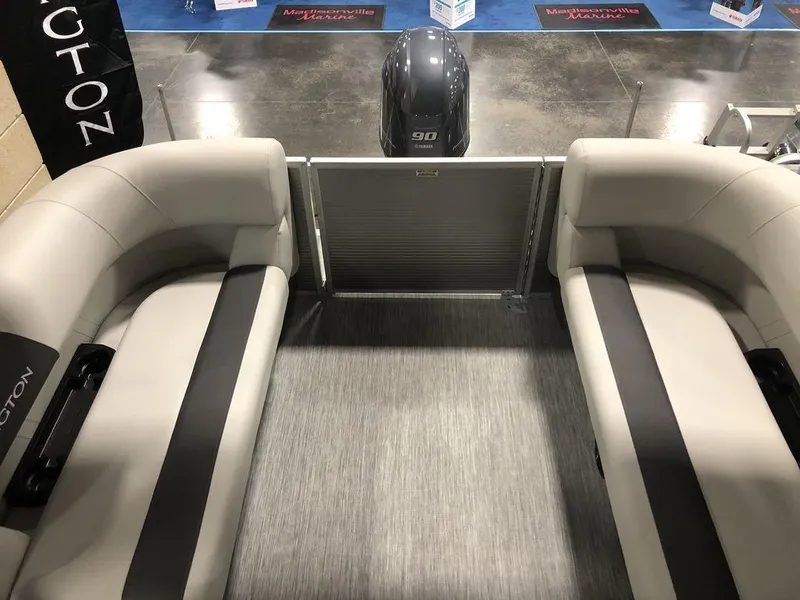 Slide: The Image of 2025 Bennington S Quad Bench 20 SSR interior with dual seating and motor view. - 5