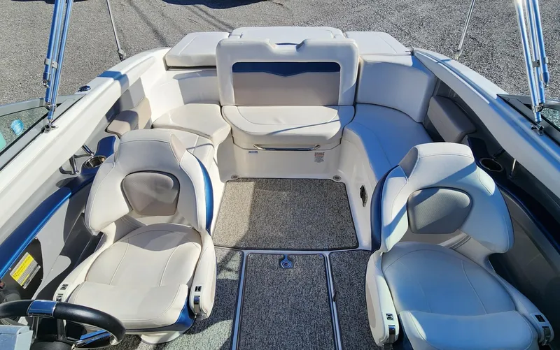 Slide: The Image of 2015 Chaparral 226 SSi boat interior with plush seating and modern design. - 13