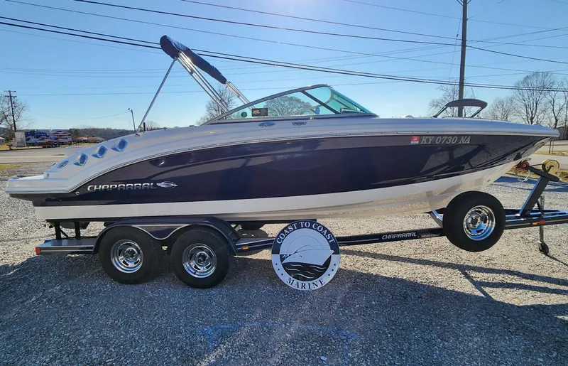 Slide: The Image of 2015 Chaparral 226 SSi boat on trailer, side view, outdoors. - 3