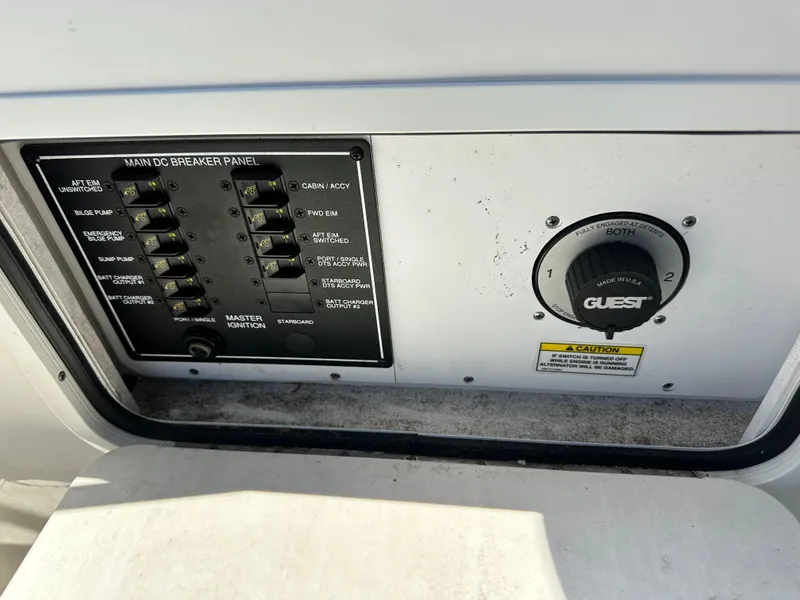 Slide: The Image of Main DC breaker panel and switch on 2009 Sea Ray 280 Sundancer boat. - 38