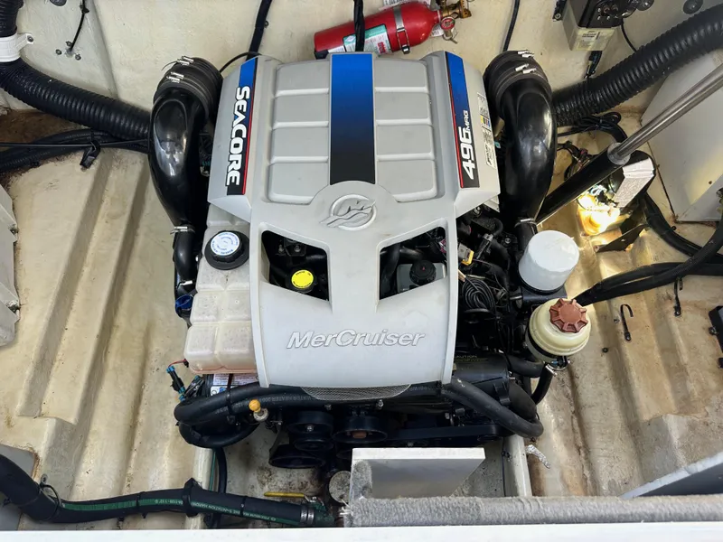Slide: The Image of Engine of a 2009 Sea Ray 280 Sundancer boat, featuring a MerCruiser 496 MAG. - 42