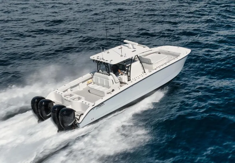 Slide: The Image of 2018 Invincible 40 Catamaran cruising on open ocean waters. - 27