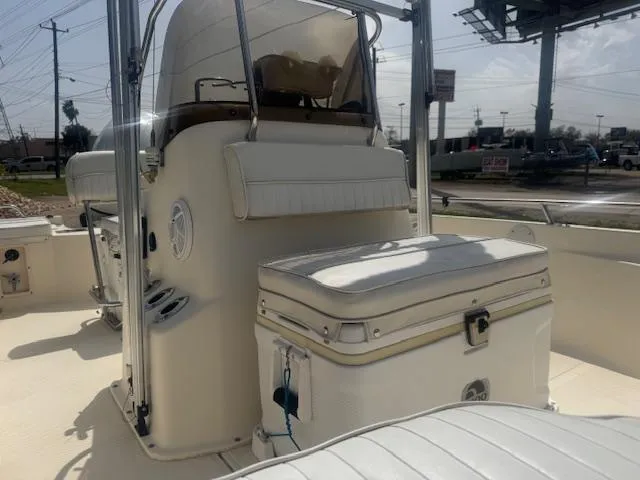 Slide: The Image of 2004 Key West 196 Bay Reef boat interior with seating and console. - 12