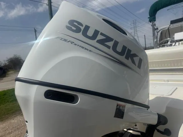 Slide: The Image of Suzuki four-stroke outboard motor on 2004 Key West 196 Bay Reef boat. - 5