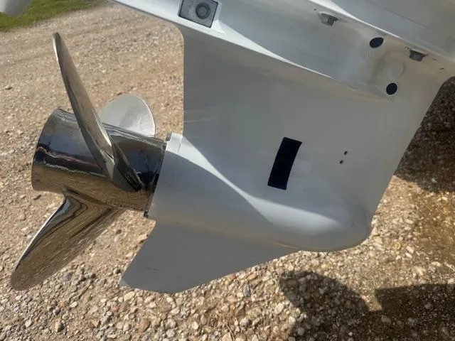 Slide: The Image of Propeller of a 2004 Key West 196 Bay Reef boat on gravel surface. - 7