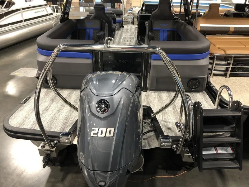 Slide: The Image of 2025 Bennington M Quad Bench 24 MFB pontoon boat with powerful 200 HP engine. - 13
