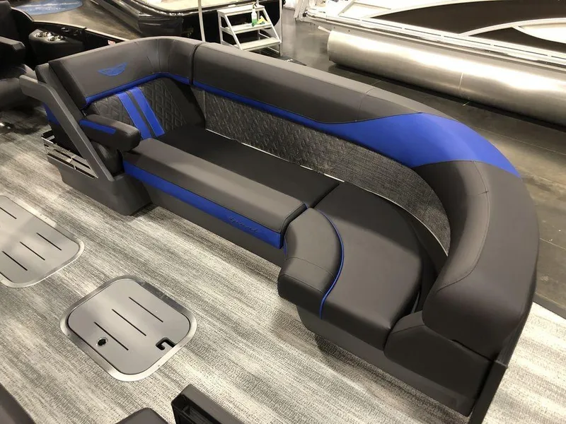 Slide: The Image of 2025 Bennington M Quad Bench 24 MFB with sleek black and blue upholstery. - 5