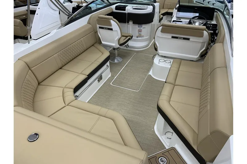 Slide: The Image of Luxurious interior of 2020 Sea Ray 280 SLX boat with beige seating. - 11