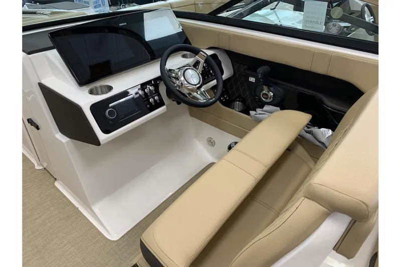 Slide: The Image of 2020 Sea Ray 280 SLX boat interior with modern dashboard and steering wheel. - 13