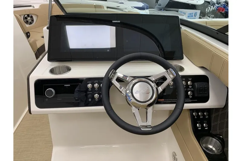 Slide: The Image of 2020 Sea Ray 280 SLX boat dashboard with steering wheel and control panel. - 14