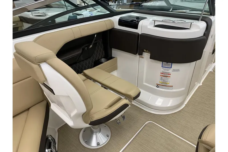 Slide: The Image of 2020 Sea Ray 280 SLX boat interior with beige seating and modern design. - 15