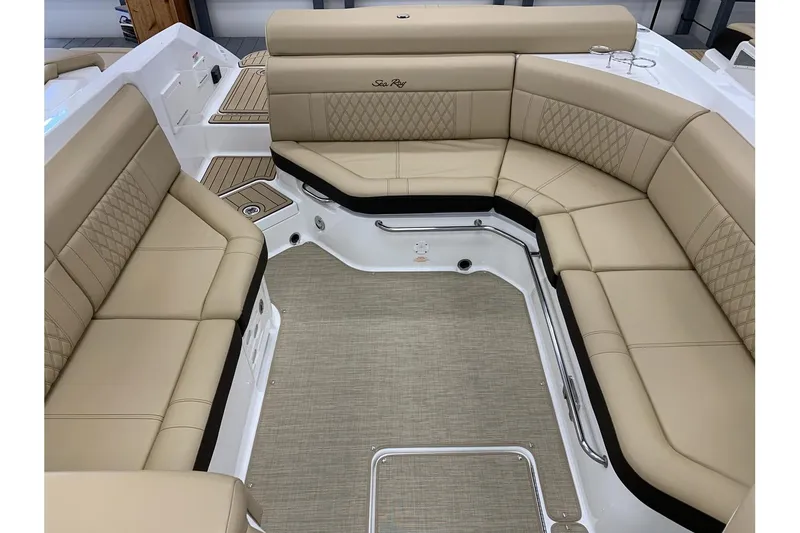 Slide: The Image of Luxurious seating area on a 2020 Sea Ray 280 SLX boat with beige upholstery. - 19