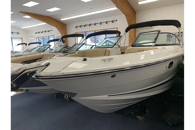 Slide: The Image of 2020 Sea Ray 280 SLX boat displayed indoors, featuring sleek design and modern amenities. - 2