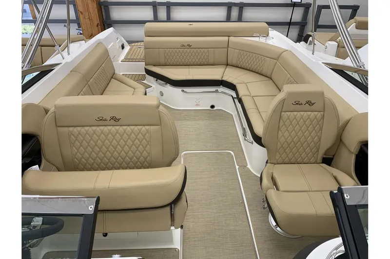Slide: The Image of Luxurious interior of 2020 Sea Ray 280 SLX boat with beige leather seating. - 26
