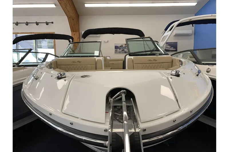 Slide: The Image of 2020 Sea Ray 280 SLX boat in showroom, front view with sleek design. - 4