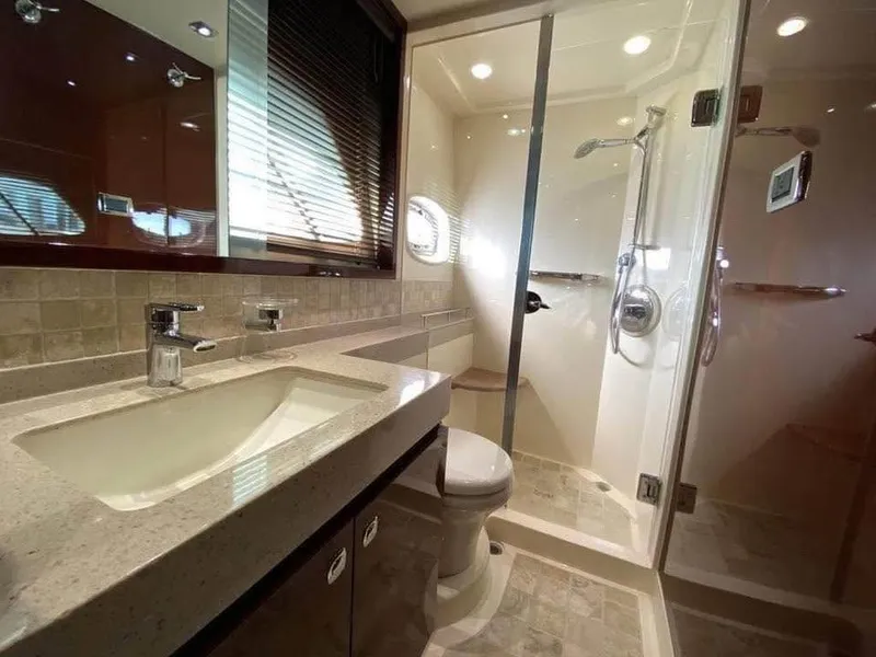 Slide: The Image of Luxurious bathroom in 2010 Sea Ray 540 Sundancer yacht with modern fixtures and spacious shower. - 18