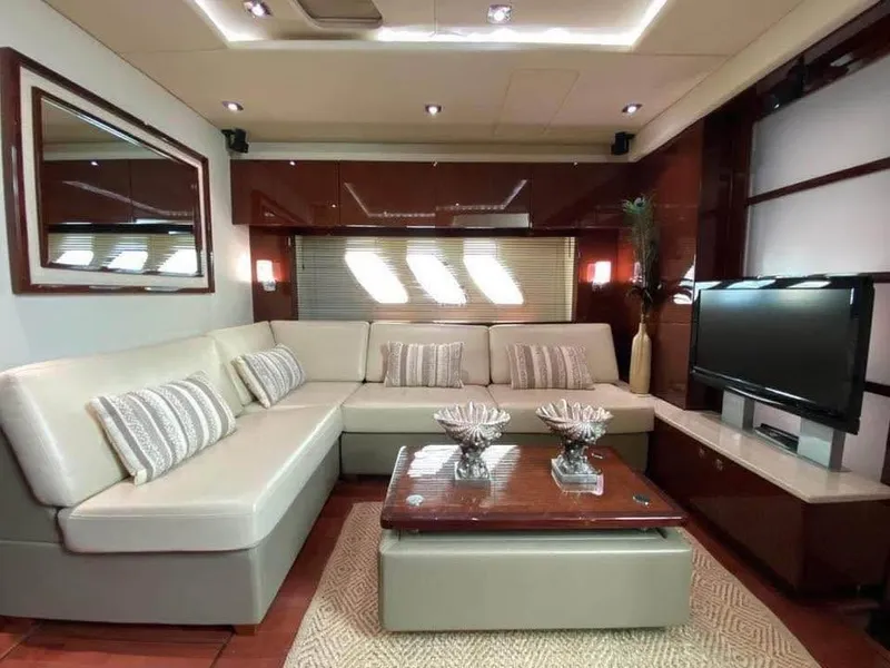 Slide: The Image of Luxurious interior of 2010 Sea Ray 540 Sundancer yacht with elegant seating and modern decor. - 9