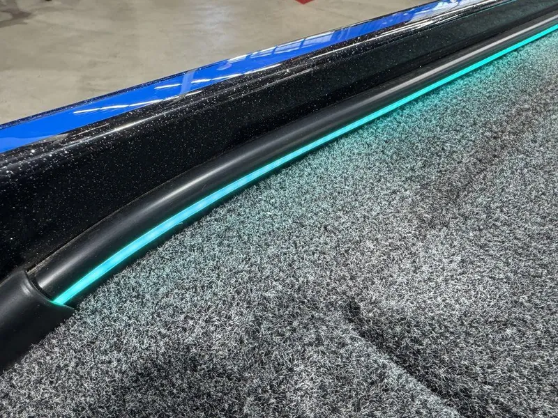 Slide: The Image of 2022 Nitro Z19 Pro boat deck with LED lighting and textured surface. - 16
