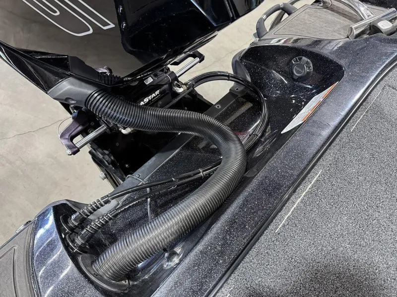 Slide: The Image of 2022 Nitro Z19 Pro boat engine compartment with cables and hoses. - 28