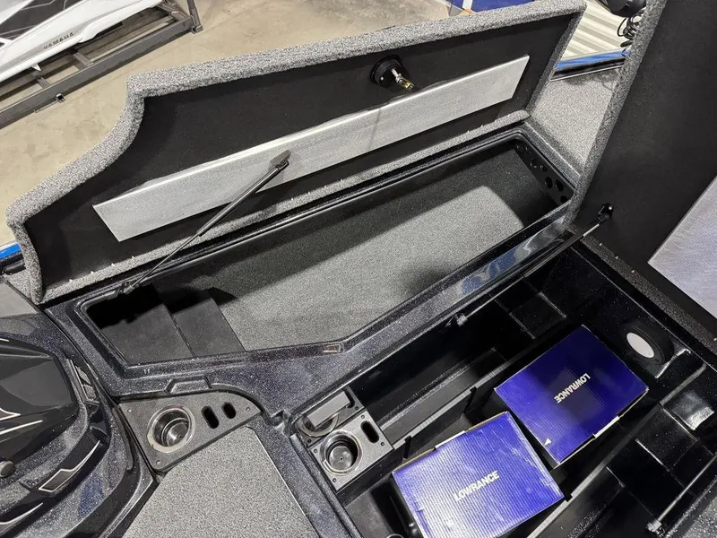 Slide: The Image of Open storage compartment in 2022 Nitro Z19 Pro boat with electronic equipment. - 30