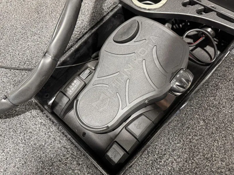 Slide: The Image of 2022 Nitro Z19 Pro boat control panel with steering wheel and switches. - 33