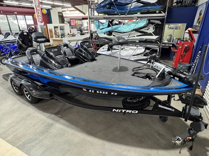 Slide: The Image of 2022 Nitro Z19 Pro bass boat in showroom, featuring sleek design and modern equipment. - 4