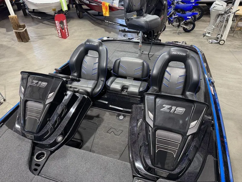 Slide: The Image of 2022 Nitro Z19 Pro boat interior with sleek black seating and modern design. - 43