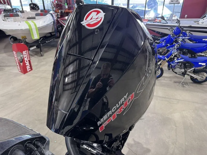 Slide: The Image of 2022 Nitro Z19 Pro with Mercury Pro outboard engine in showroom. - 44