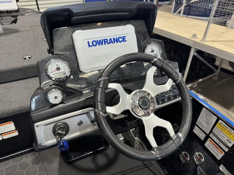 Slide: The Image of Steering console of 2022 Nitro Z19 Pro boat with Lowrance display and gauges. - 45